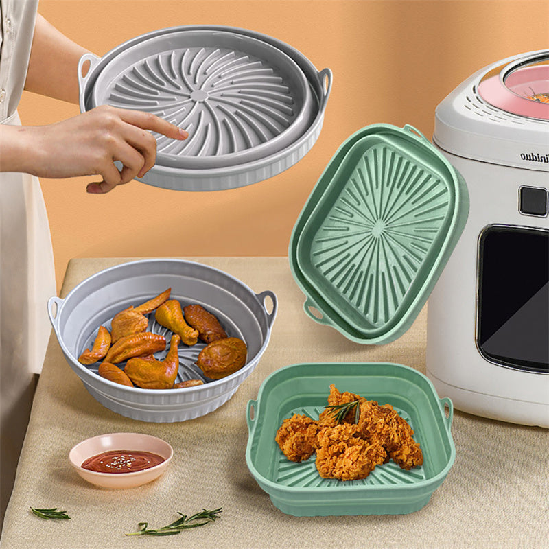 Air Fryer Silicone Pot in gray and green displayed with food, showcasing collapsible design and compatibility with air fryers.