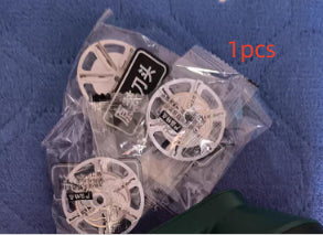 Replacement blades for USB Rechargeable Lint Remover packed in plastic, ideal for maintaining fabric care.